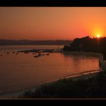 Foto: "Ocaso rojizo en la playa de Miño" de Charo Parras Osado