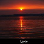Foto: "Puesta de sol en la Playa del Terrón en Vilanova" de Loreto  López Baltar